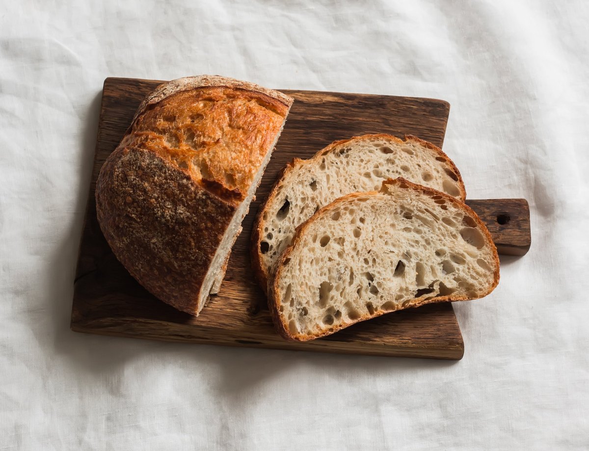 Artisan sourdough tartine on wooden board